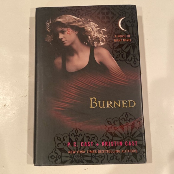 “Burned,” - Picture 1 of 2